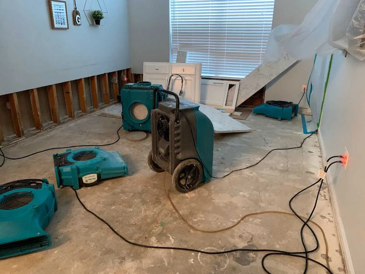 Dehumidifier in flood-cut room for Water Damage Restoration in Bedford